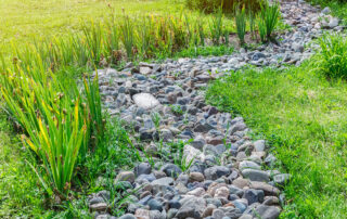 Dry Creek Bed Landscaping for Drainage – Texomaland & North Texas