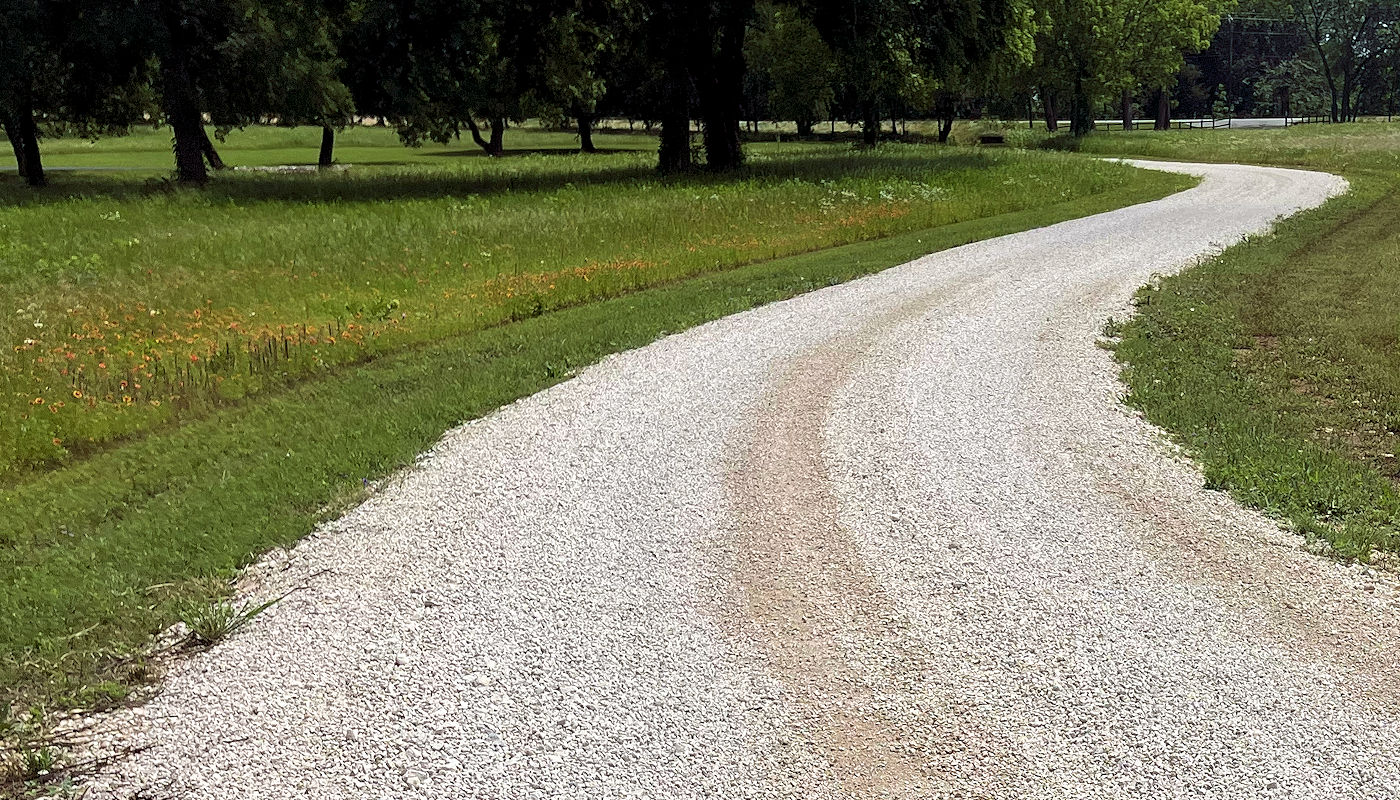 Is there a difference in building a gravel road or a gravel drive or driveway? – Texoma Excavation & Construction Road & Driveway Surface Layer Construction Materials Choices - Texoma Excavation & Construction