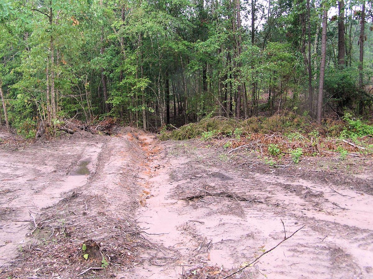 Water Bar Building Gravel Roads: Cutting Water Bars Before Gravel